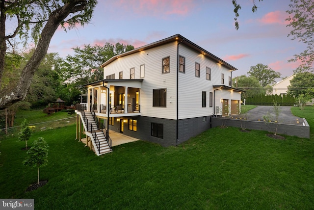 1052 Balls Hill Rd, Mclean, VA 22101 - rear view of house with stairway, a wooden deck, and a lawn