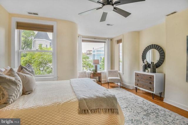 908 Westminster St NW, Washington, DC 20001 - bedroom with baseboards, wood finished floors, and ceiling fan