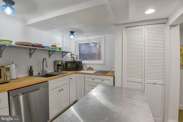 908 Westminster St NW, Washington, DC 20001 - kitchen with stainless steel dishwasher, black microwave, wood counters, open shelves, and a sink
