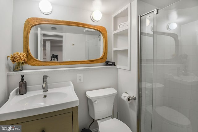 908 Westminster St NW, Washington, DC 20001 - bathroom featuring toilet, vanity, and a stall shower