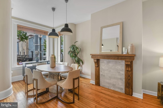 908 Westminster St NW, Washington, DC 20001 - dining area featuring healthy amount of natural light, wood-type flooring, and baseboards