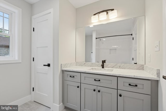 721 Walden Rd, Elkins Park, PA 19027 - bathroom featuring baseboards, vanity, a shower, and tile patterned floors