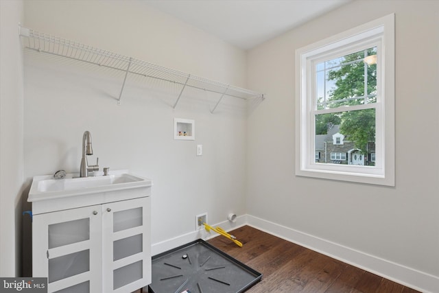 721 Walden Rd, Elkins Park, PA 19027 - laundry room with baseboards, hookup for a washing machine, dark wood-style floors, and cabinet space