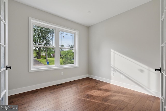 721 Walden Rd, Elkins Park, PA 19027 - empty room featuring baseboards and dark wood-type flooring