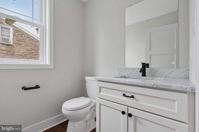 721 Walden Rd, Elkins Park, PA 19027 - bathroom with vanity, baseboards, toilet, and wood finished floors