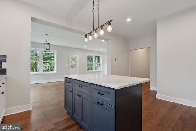 721 Walden Rd, Elkins Park, PA 19027 - kitchen featuring dark wood-style flooring, recessed lighting, pendant lighting, light stone countertops, and a kitchen island