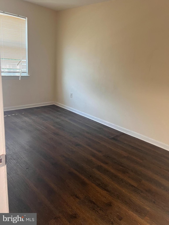 1605 Levis St NE, Washington, DC 20002 - empty room featuring dark wood-type flooring