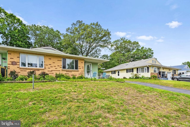 151 Elmtowne Blvd, Hammonton, NJ 08037 - ranch-style home with brick siding and a front lawn