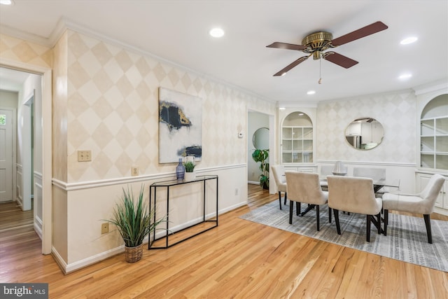 8305 Toll House Rd, Annandale, VA 22003 - dining space featuring ornamental molding, a ceiling fan, wood finished floors, wallpapered walls, and recessed lighting
