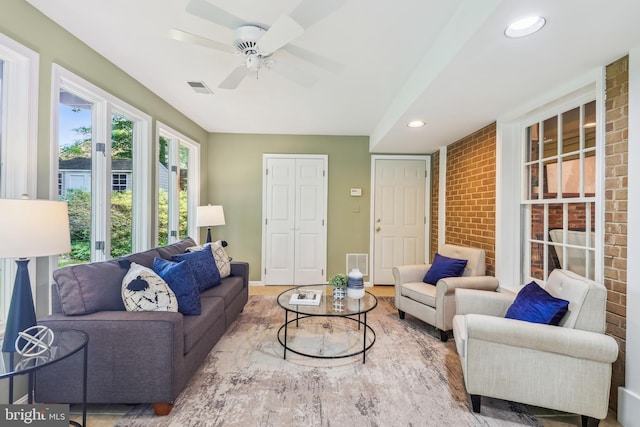 8305 Toll House Rd, Annandale, VA 22003 - living room with ceiling fan, brick wall, recessed lighting, and wood finished floors