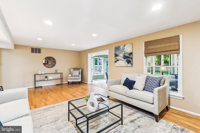 8305 Toll House Rd, Annandale, VA 22003 - living area with wood finished floors and recessed lighting