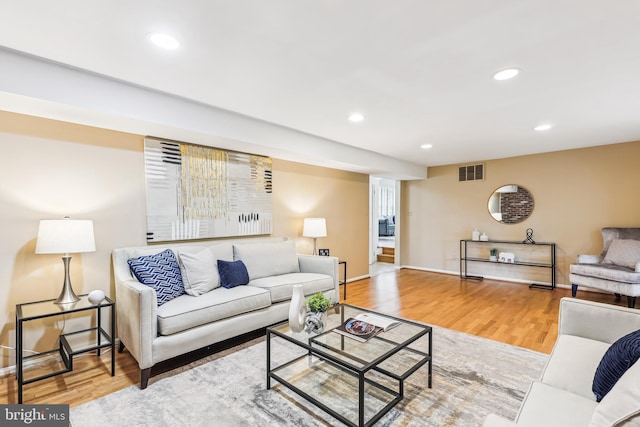 8305 Toll House Rd, Annandale, VA 22003 - living room with wood finished floors and recessed lighting