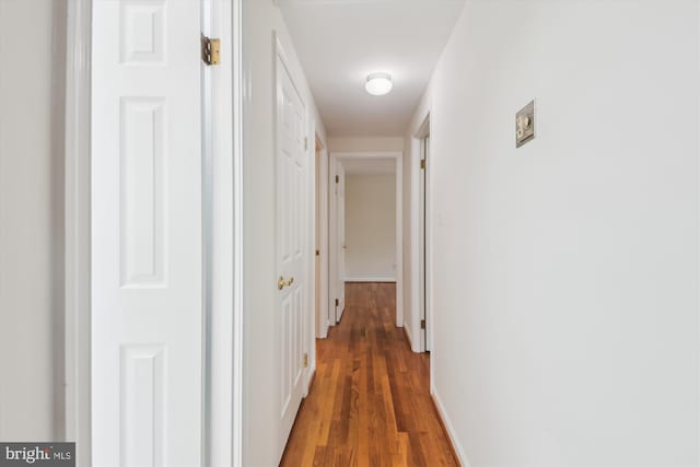 8305 Toll House Rd, Annandale, VA 22003 - hall featuring wood finished floors and baseboards