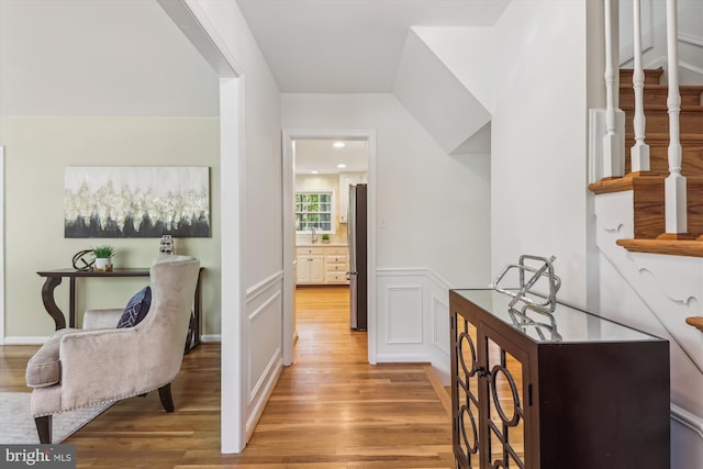 8305 Toll House Rd, Annandale, VA 22003 - hallway featuring light wood-type flooring