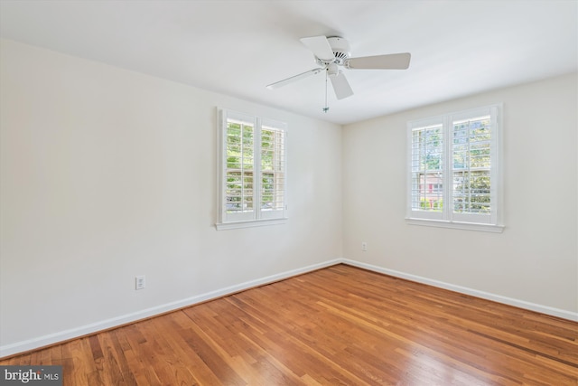 8305 Toll House Rd, Annandale, VA 22003 - empty room featuring plenty of natural light, wood finished floors, and a ceiling fan