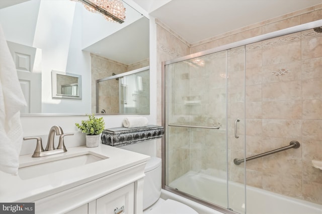 8305 Toll House Rd, Annandale, VA 22003 - bathroom featuring vanity and bath / shower combo with glass door