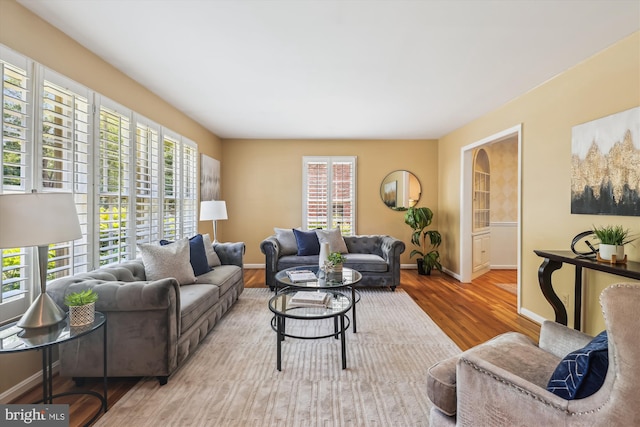 8305 Toll House Rd, Annandale, VA 22003 - living room featuring baseboards and wood finished floors