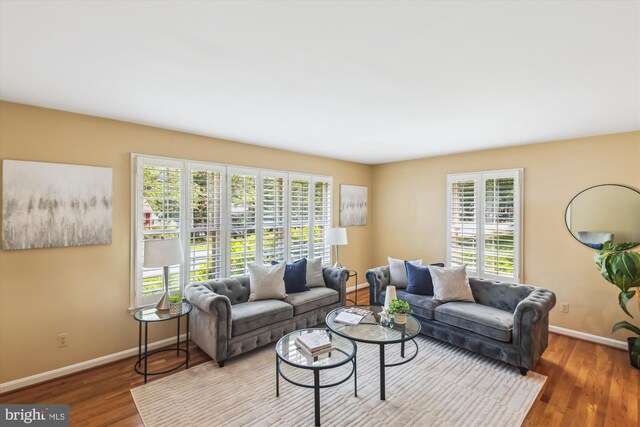8305 Toll House Rd, Annandale, VA 22003 - living area with baseboards and wood finished floors