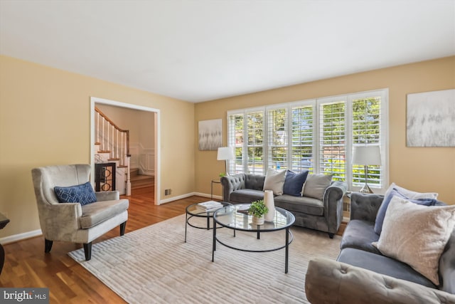 8305 Toll House Rd, Annandale, VA 22003 - living room featuring wood finished floors and stairway