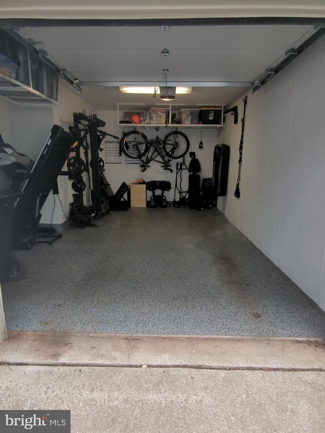 12215 Wye Oak Commons Cir Unit 66, Burke, VA 22015 - garage featuring a garage door opener