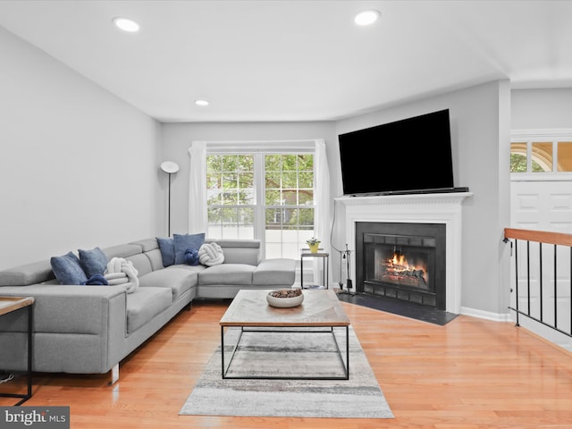 12215 Wye Oak Commons Cir Unit 66, Burke, VA 22015 - living area featuring wood finished floors, a fireplace with flush hearth, and recessed lighting