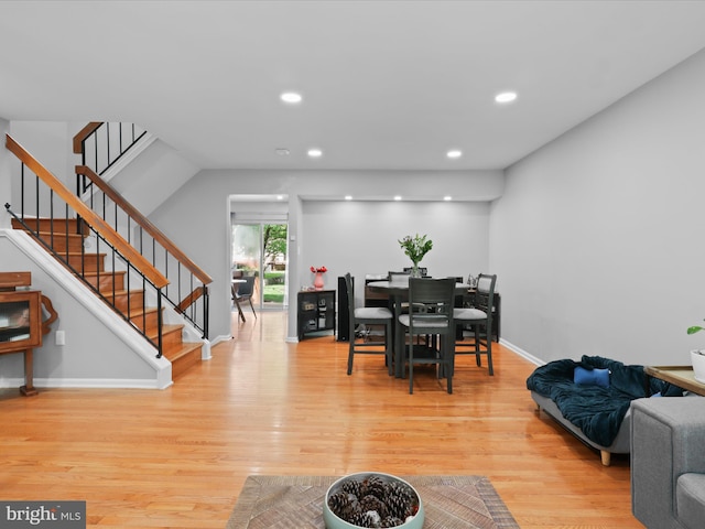 12215 Wye Oak Commons Cir Unit 66, Burke, VA 22015 - dining space with light wood-style flooring, stairway, baseboards, and recessed lighting