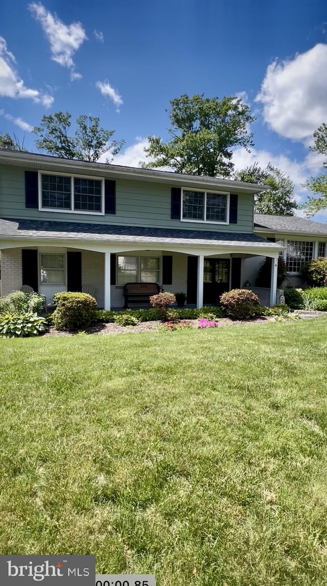 15 Vassar Dr, Newark, DE 19711 - view of front of property with a front yard and a porch