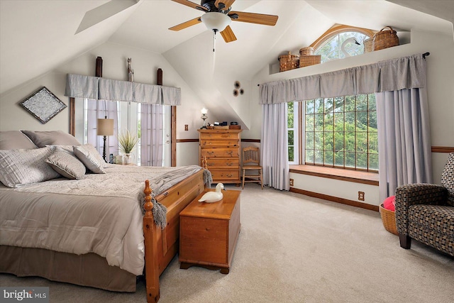 8807 Woodland Ferry Rd, Laurel, DE 19956 - bedroom with carpet, lofted ceiling, multiple windows, baseboards, and ceiling fan