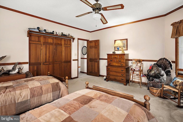 8807 Woodland Ferry Rd, Laurel, DE 19956 - carpeted bedroom with ornamental molding, a ceiling fan, baseboards, a textured ceiling, and a closet