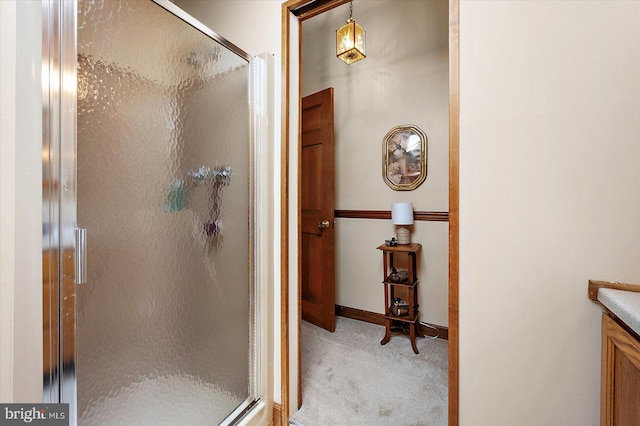 8807 Woodland Ferry Rd, Laurel, DE 19956 - full bathroom featuring a stall shower, vanity, and baseboards