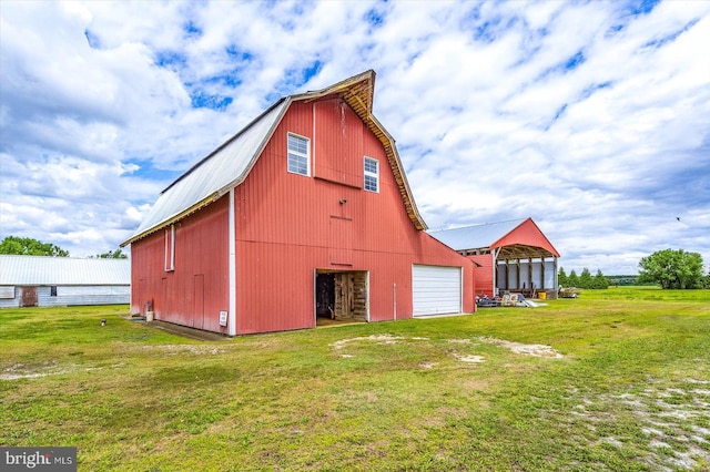 8807 Woodland Ferry Rd, Laurel, DE 19956 - view of barn featuring a yard and driveway