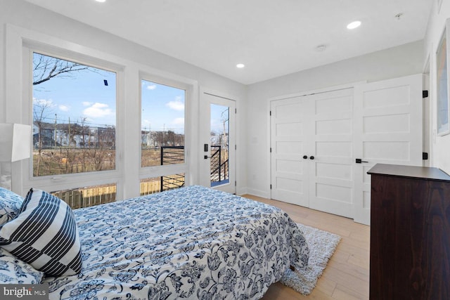 1368 Bryant St NE Unit 4, Washington, DC 20018 - bedroom with access to outside, light wood-style floors, recessed lighting, and a closet