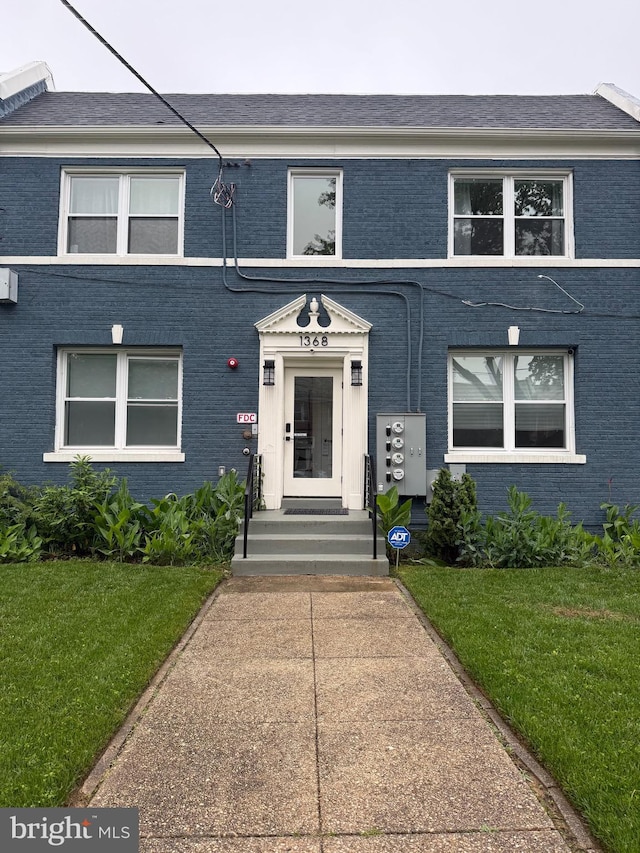 1368 Bryant St NE Unit 4, Washington, DC 20018 - view of front of property with a front yard and brick siding