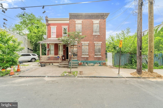 1830 Filmore St, Camden, NJ 08104 - townhome / multi-family property with brick siding and a porch