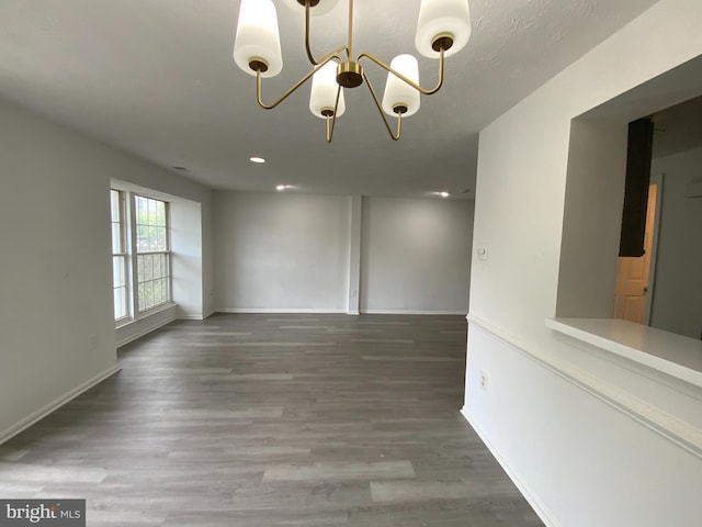 508 Boysenberry Ln, Frederick, MD 21703 - unfurnished room with a chandelier, wood finished floors, baseboards, and recessed lighting