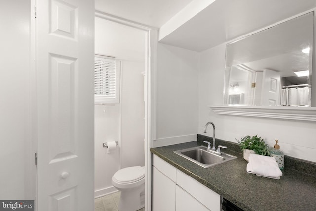 4339 Brandywine St NW, Washington, DC 20016 - bathroom with vanity, toilet, and a shower with shower curtain