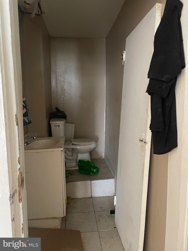 2430 N 4th St, Philadelphia, PA 19133 - half bath featuring vanity, toilet, and tile patterned flooring