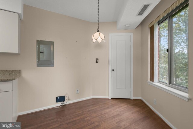 5802 Nicholson Ln Unit 2-407, Rockville, MD 20852 - unfurnished dining area featuring electric panel, wood finished floors, and baseboards