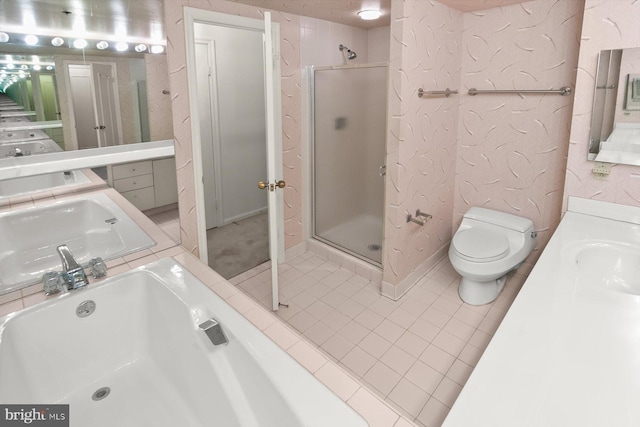 5802 Nicholson Ln Unit 2-407, Rockville, MD 20852 - bathroom featuring tile patterned flooring, vanity, a shower stall, and toilet