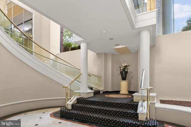 5802 Nicholson Ln Unit 2-407, Rockville, MD 20852 - stairs with inlaid floor details, tile patterned floors, and recessed lighting