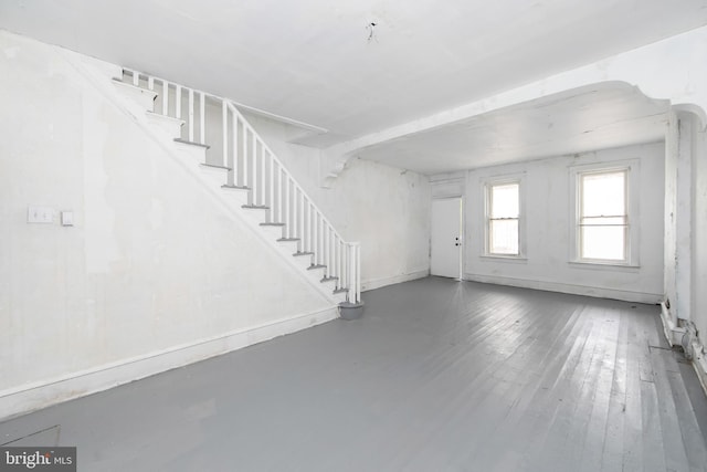 1314 Atlantic Ave, Camden, NJ 08104 - unfurnished living room featuring stairway and baseboards