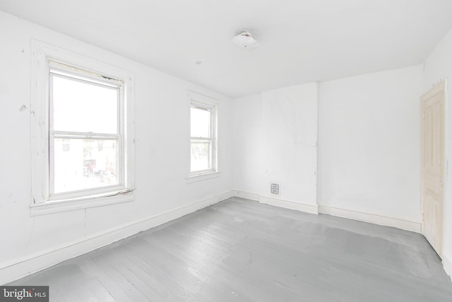 1314 Atlantic Ave, Camden, NJ 08104 - spare room featuring wood finished floors and baseboards