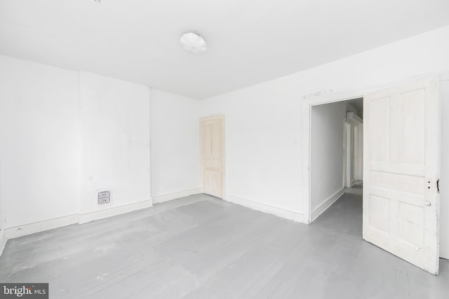 1314 Atlantic Ave, Camden, NJ 08104 - unfurnished room featuring baseboards and wood finished floors