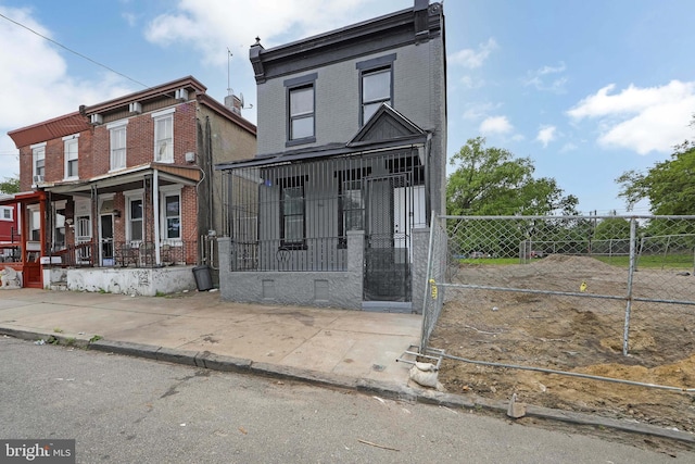 1314 Atlantic Ave, Camden, NJ 08104 - townhome / multi-family property featuring a porch and brick siding