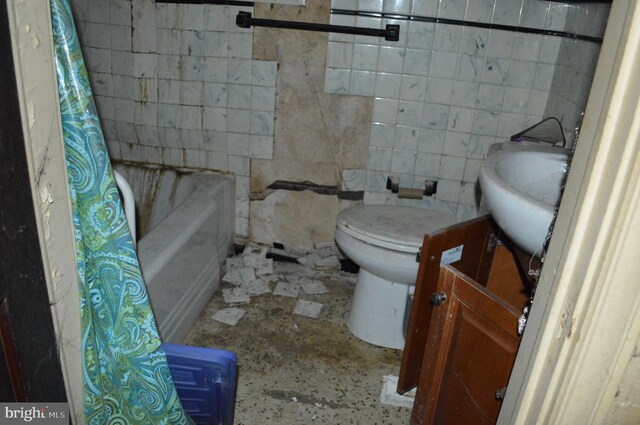 2901 Edison Hwy, Baltimore, MD 21213 - bathroom with vanity, toilet, and tile walls