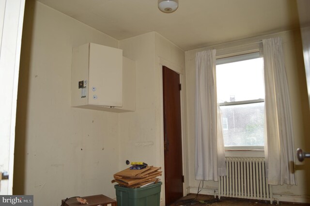 2901 Edison Hwy, Baltimore, MD 21213 - interior space featuring radiator heating unit and healthy amount of natural light