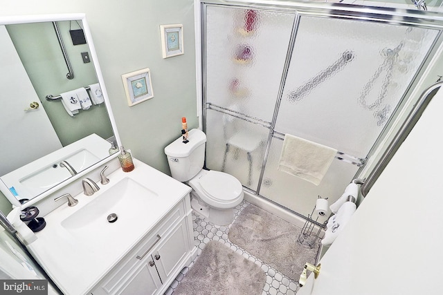 2028 Brookdale Dr, Forked River, NJ 08731 - bathroom with toilet, a shower stall, vanity, and tile patterned floors
