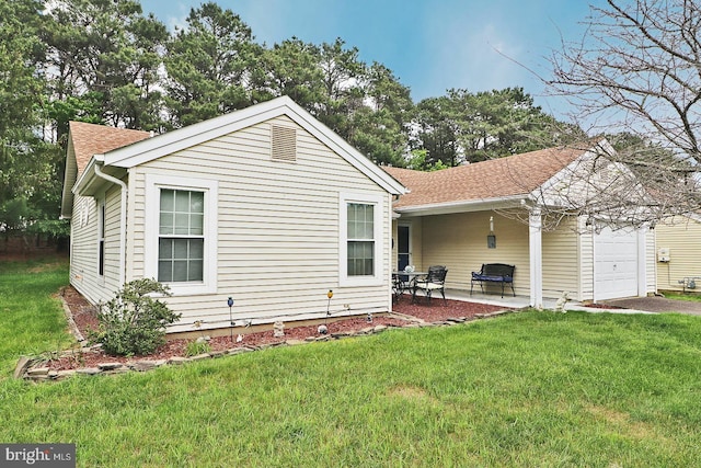 2028 Brookdale Dr, Forked River, NJ 08731 - view of property exterior with an attached garage, a shingled roof, a yard, and a patio