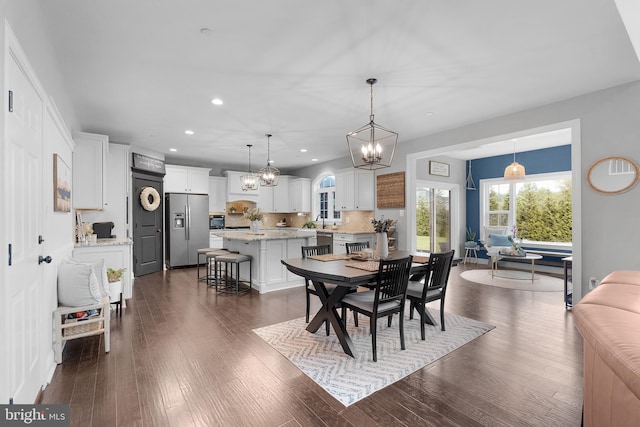 815 Summersweet Ct, Huntingtown, MD 20639 - dining space featuring a chandelier, recessed lighting, and dark wood-type flooring