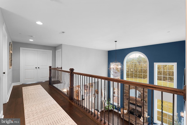 815 Summersweet Ct, Huntingtown, MD 20639 - hall with a chandelier, wood finished floors, recessed lighting, and baseboards